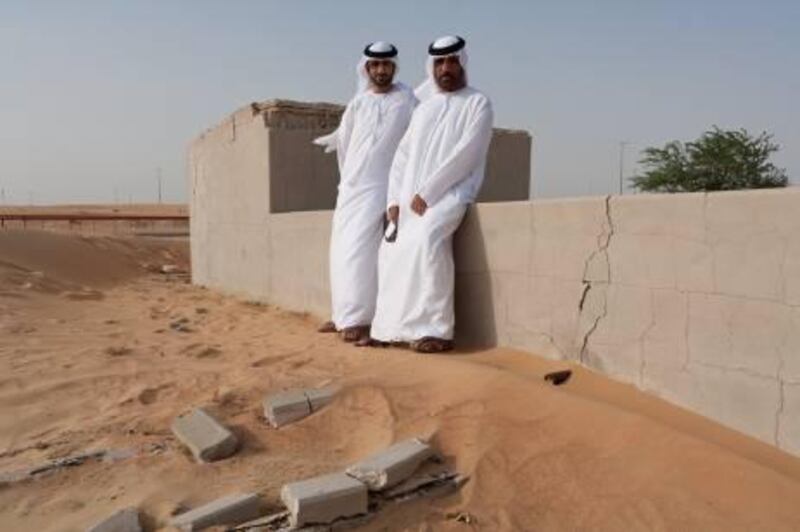 Thani Mohammed Bim Belaisha (L) with his uncle Majed Thani Bim Belaisha Al Falasi. The well is named Belaisha after Majeds father who built it in 1964 at a depth of 20 arm spans (30 meters approx). The well eventually dried up in 1974 but Majed still remembers it as an importaint focal point and rest station for traveling bedouin, he plans to eventually refurbish the well. Duncan Chard for the National