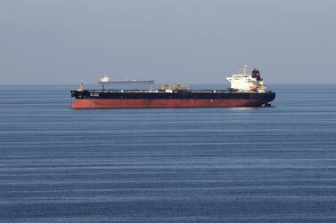 FILE PHOTO: An unidentified oil tankers pass through the Strait of Hormuz.  Reuters, file 