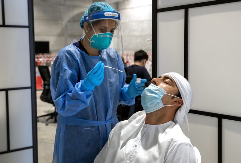 Abu Dhabi, United Arab Emirates, March 24, 2021.  An Abu Dhabi resident gets a PCR test at the Covid-19 testing centre of Biogenix Labs at G42 in Masdar City. 
Victor Besa/The National
Section:  NA
Reporter:  Shireena Al Nowais