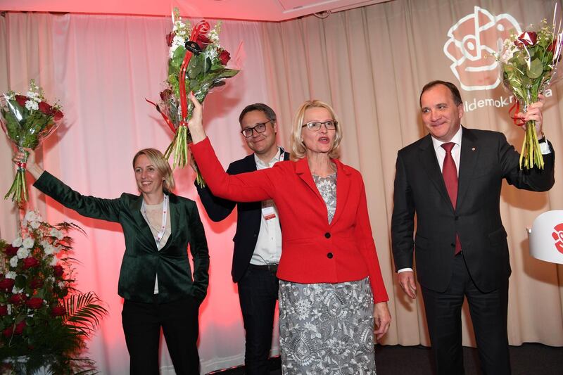 Social Democrats top candidates Jytte Guteland, Johan Danielsson, Heléne Fritzon together with Prime Minister Stefan Lofven during the party's election night watch party in Stockholm, Sweden. Reuters