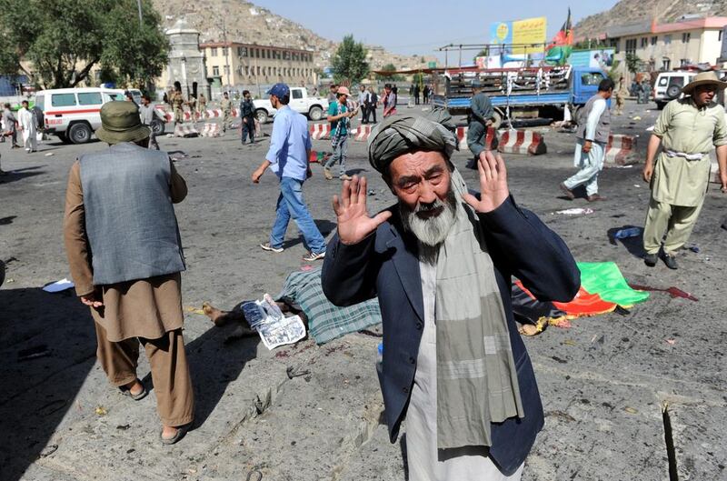 A Hazara man reacts after a bomb attack that targeted a demonstration by the minority community in Kabul in 2016. EPA