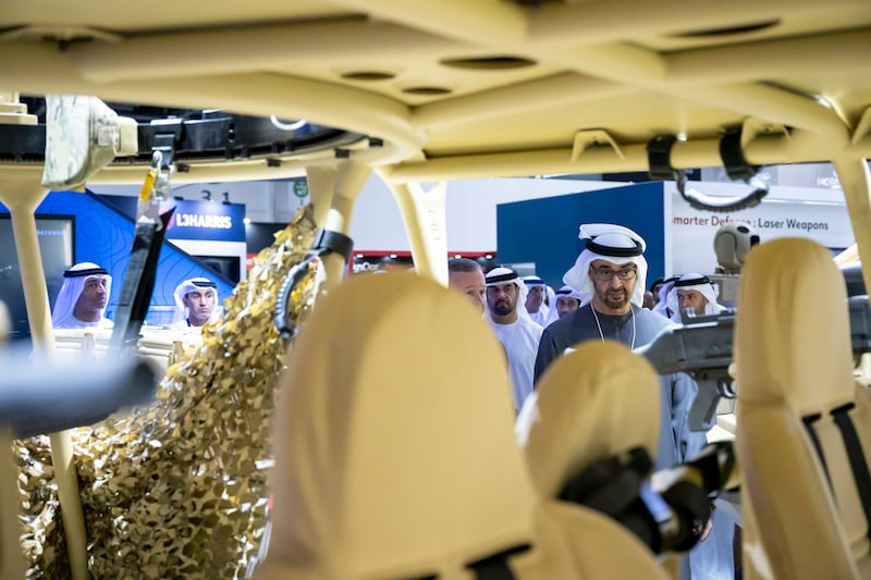 The President views an exhibit at Idex