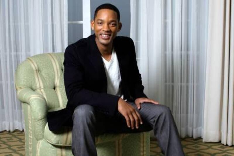 Actor Will Smith poses for a photo in Los Angeles on Friday, Nov. 30, 2007. Smith stars in the new film "I Am Legend." (AP Photo/Kevork Djansezian)