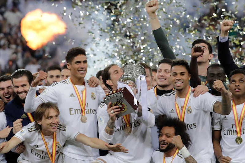 Real Madrid celebrate after winning the 2020 Spanish Super Cup final against Atletico Madrid at the King Abdullah Sports City in Jeddah. AP Photo