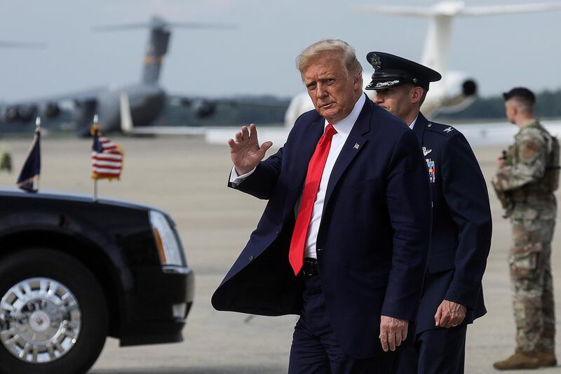 U.S. President Donald Trump waves after returning to Washington from travel to Wilmington, North Carolina at Joint Base Andrews, Maryland, U.S., September 2, 2020. REUTERS/Leah Millis