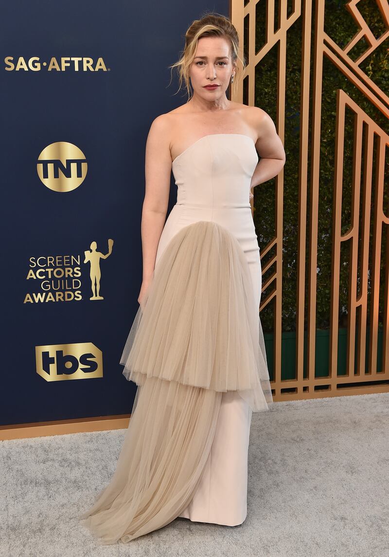 Piper Perabo arrives in a nude ruffled gown. AP