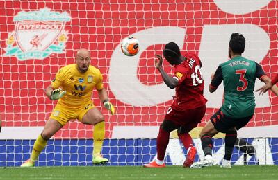 Soccer Football - Premier League - Liverpool v Aston Villa - Anfield, Liverpool, Britain - July 5, 2020  Liverpool's Sadio Mane scores their first goal, as play resumes behind closed doors following the outbreak of the coronavirus disease (COVID-19) REUTERS / Carl Recine / Pool  EDITORIAL USE ONLY. No use with unauthorized audio, video, data, fixture lists, club/league logos or "live" services. Online in-match use limited to 75 images, no video emulation. No use in betting, games or single club/league/player publications.  Please contact your account representative for further details.