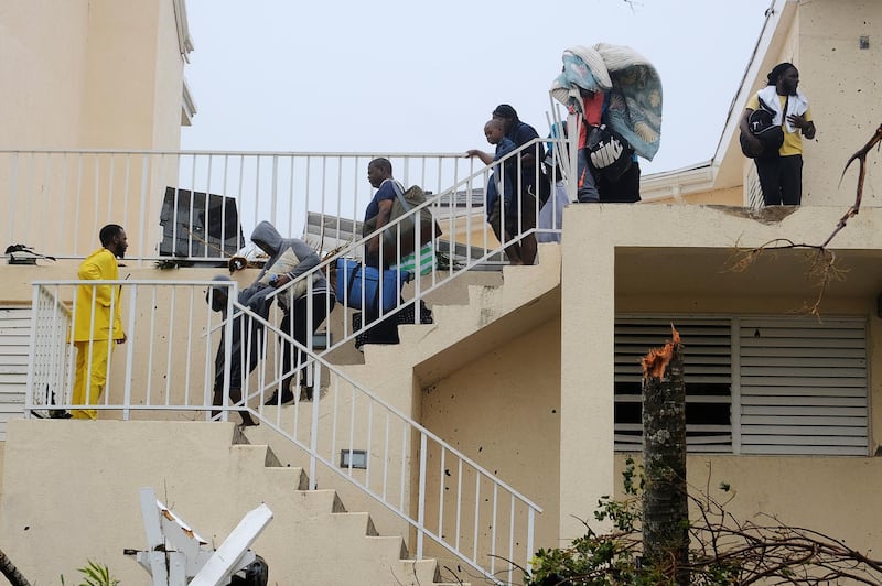 Resort guests relocate to a shelter area at Abaco Beach Resort during the eye of Hurricane Dorian on the Great Abaco island town of Marsh Harbour, Bahamas.  Reuters