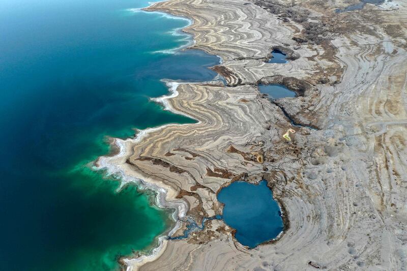 Near Ein Gedi, sinkholes formed as a result of a drop in the water level in the Dead Sea.