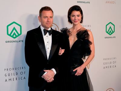Ewan McGregor, left, and Mary Elizabeth Winstead arrive at the 33rd annual Producers Guild Awards on Saturday, March 19, 2022, at the Fairmont Century Plaza Hotel in Los Angeles. AP Photo