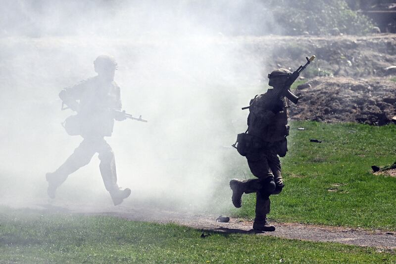 Ukrainian soldiers take part in urban combat exercises at a British Army military base in northern England on June 2, 
as the country prepares for its long-awaited offensive. AFP