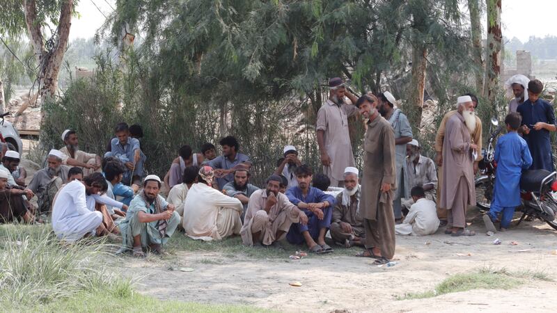 Afghan refugees find shade to beat the scorching heat at Kheshgi Village Camp, Nowshera, Khyber Pakhtunkhwa. Photos: Tariq Ullah for The National