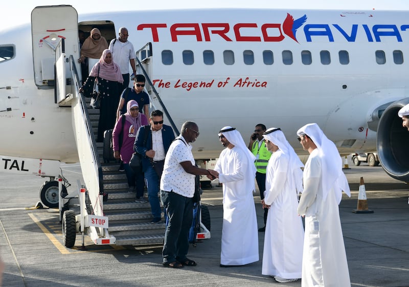 An evacuation flight from Sudan operated by the UAE lands at Abu Dhabi International Airport. All photos: Khushnum Bhandari / The National