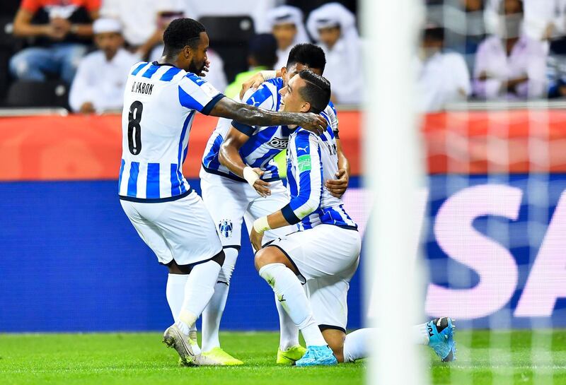 Rogelio Funes (R) of Monterrey celebrates with teammates after scoring the second goa. EPA