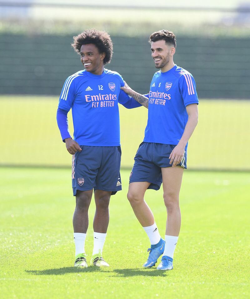 ST ALBANS, ENGLAND - MARCH 30: (L-R) Willian and Dani Ceballos of Arsenal during a training session at London Colney on March 30, 2021 in St Albans, England. (Photo by Stuart MacFarlane/Arsenal FC via Getty Images)