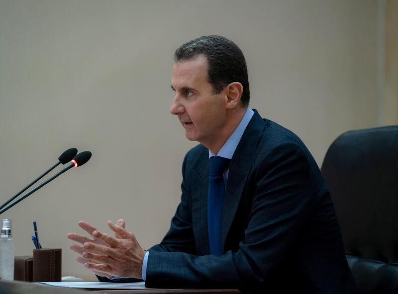 Syrian President Bashar al-Assad addresses the government committee that oversees measures to curb the spread of the coronavirus disease (COVID-19), in Damascus, Syria in this handout released by SANA on May 4, 2020. SANA/Handout via REUTERS ATTENTION EDITORS - THIS IMAGE WAS PROVIDED BY A THIRD PARTY. REUTERS IS UNABLE TO INDEPENDENTLY VERIFY THIS IMAGE