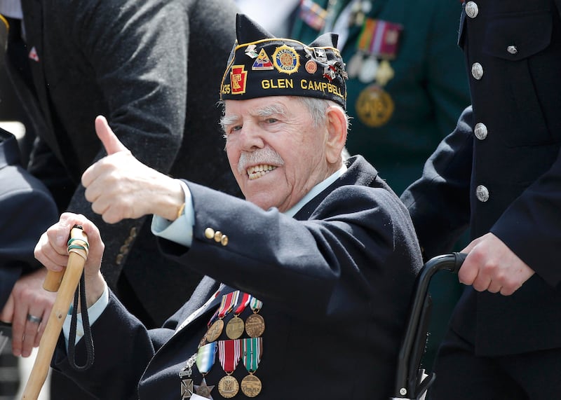 A British veteran during an armed forces and veterans' parade to mark the 70th anniversary of VE Day in central London on May 10, 2015. AFP