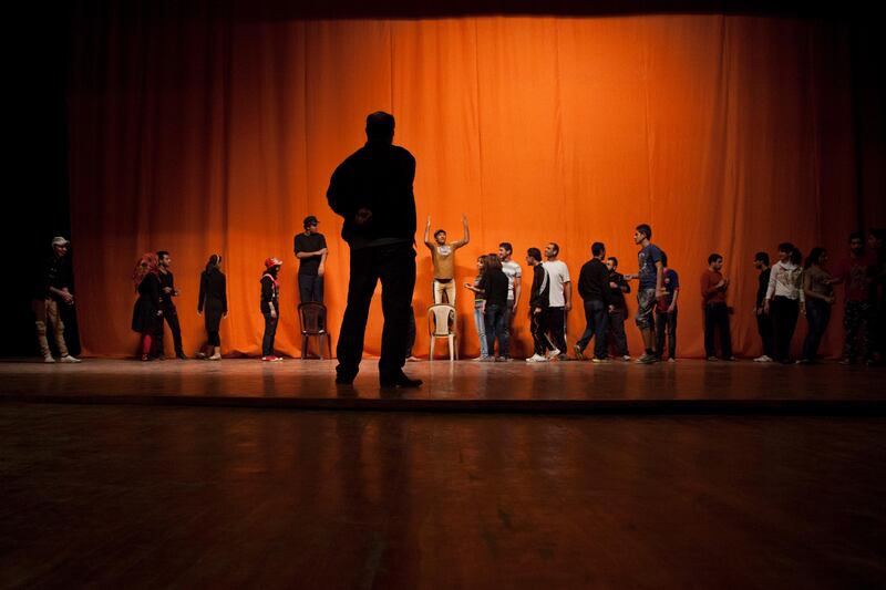 BAGHDAD, IRAQ: Drama students rehearse at the National Theatre in Baghdad.

Qassim Zeidan is directing a play with drama students at the Iraqi National Theatre about the resilience of Baghdad.

Photo by Ali Arkady/Metrography