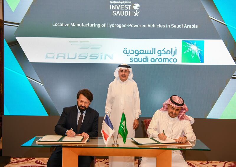 Aramco president and chief executive Amin Nasser, centre, at the signing of an agreement with French company Gaussin. Photo: Aramco