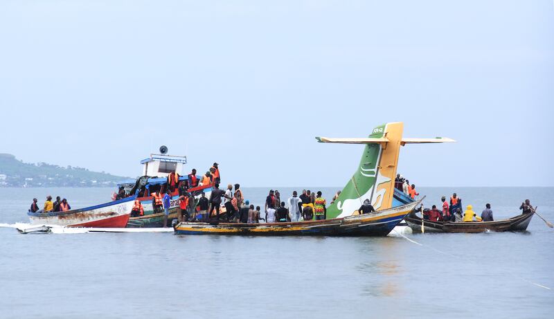 Rescue operations after a plane carrying 43 people crashed into Lake Victoria in Tanzania in bad weather.  EPA