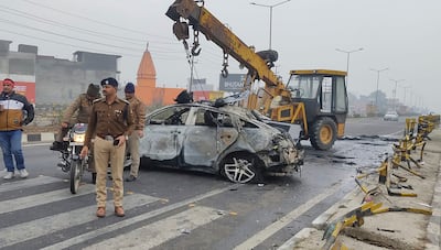 Policemen investigate the scene of a car accident involving Rishabh Pant near Roorkee, in the northern Indian state of Uttarakhand, on December 30, 2022. AP