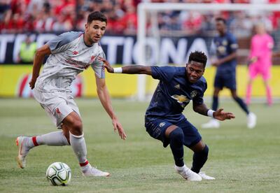 Soccer Football - International Champions Cup - Manchester United v Liverpool - Michigan Stadium, Ann Arbor, USA - July 28, 2018  Liverpool's Marko Grujic in action with Manchester United's Fred  REUTERS/Rebecca Cook