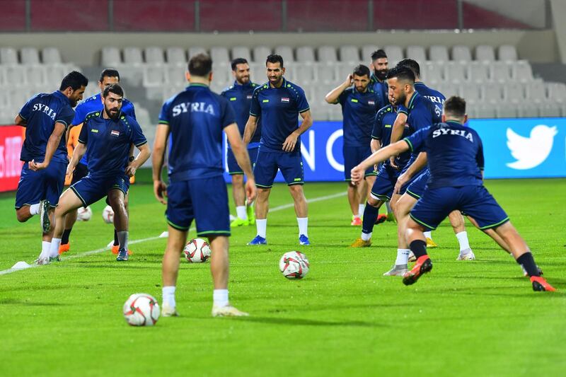 Syria's national team attends a training session at Sharjah Stadium. AFP