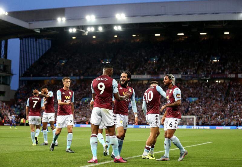 BIRMINGHAM, ENGLAND - AUGUST 23: Wesley of Aston Villa  celebrates with team mates after scoring his sides first  goal during the Premier League match between Aston Villa and Everton FC at Villa Park on August 23, 2019 in Birmingham, United Kingdom. (Photo by Alex Pantling/Getty Images)