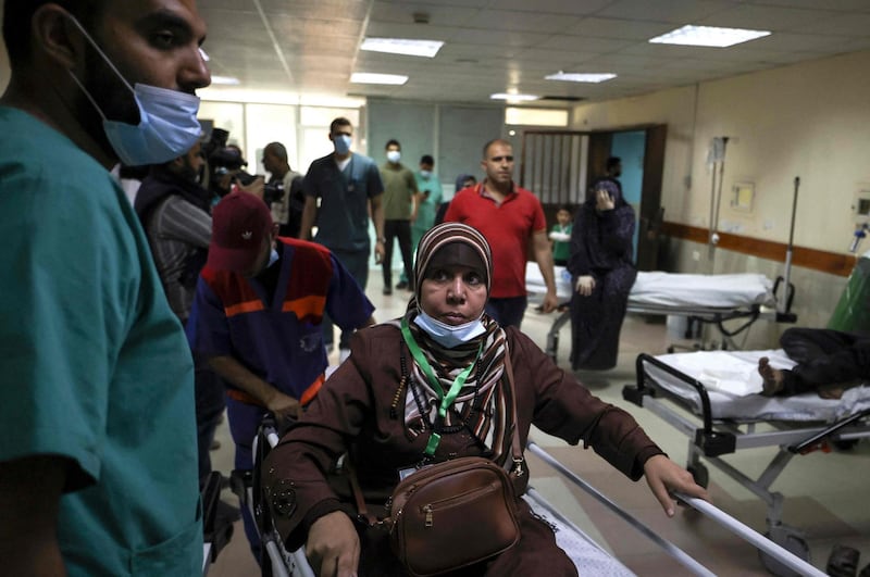 A member of the Palestinian Abu Dayer family receives treatment at Al-Shifa Hospital following an Israeli air strike on their home in Gaza city. AFP