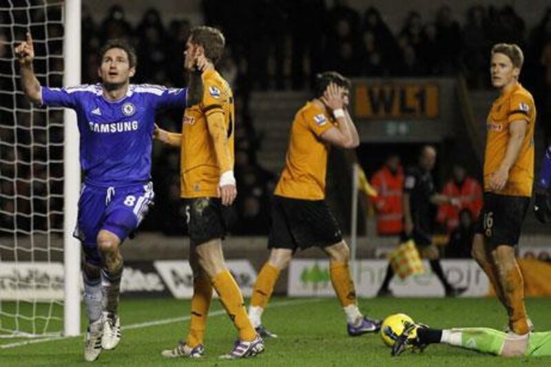 Chelsea’s Frank Lampard, left, celebrates scoring his winning goal against Wolverhampton on Monday night.