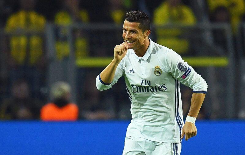 Real Madrid’s Cristiano Ronaldo celebrates after scoring their first goal against Borussia Dortmund. Bernd Thissen / EPA