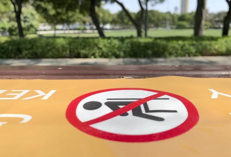 DUBAI, UNITED ARAB EMIRATES , October 10 – 2020 :- No sitting stickers pasted on the benches at the Zabeel park in Dubai. Stickers about Covid safety measures pasted all over the park for the visitors. (Pawan Singh / The National) For News/Stock/Online.