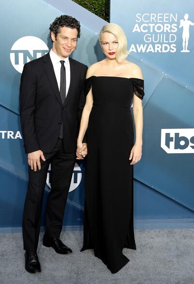 epa08143390 Thomas Kail (L) and Michelle Williams arrive for the 26th annual Screen Actors Guild Awards ceremony at the Shrine Auditorium in Los Angeles, California, USA, 19 January 2020.  EPA-EFE/DAVID SWANSON