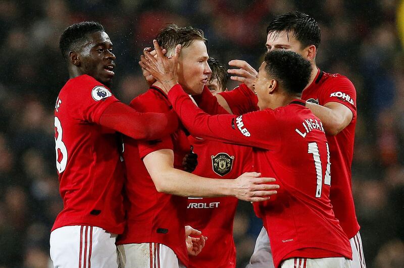 McTominay celebrates scoring their first goal with teammates. Reuters