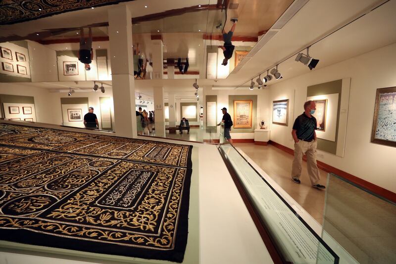 Artefacts in the gallery include sections from the Kiswah, which covers the Kaaba at the Grand Mosque in Makkah, Saudi Arabia. The heavy cloth of black silk is lined with cotton and embroidered with gold and silver.