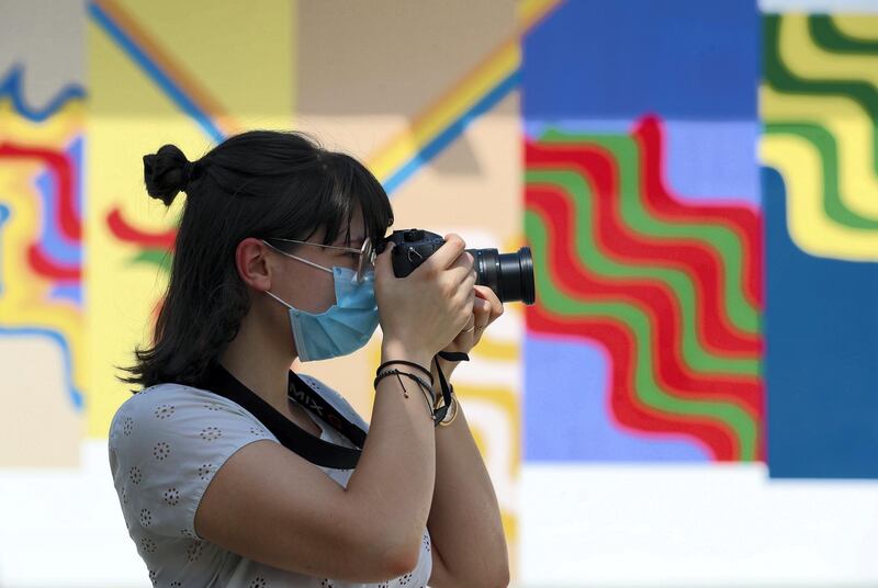 Dubai, United Arab Emirates - N/A. News. Coronavirus/Covid-19. Yulia takes pictures in Alserkal Avenue with a protective mask on. Saturday, September 12th, 2020. Dubai. Chris Whiteoak / The National