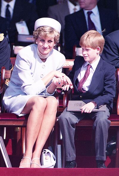 Britain's Princess Diana and son Prince Harry during a Heads of State Ceremony in Hyde Park, in London, Britain, May 7, 1995. Picture taken May 7, 1995  REUTERS/Dylan Martinez