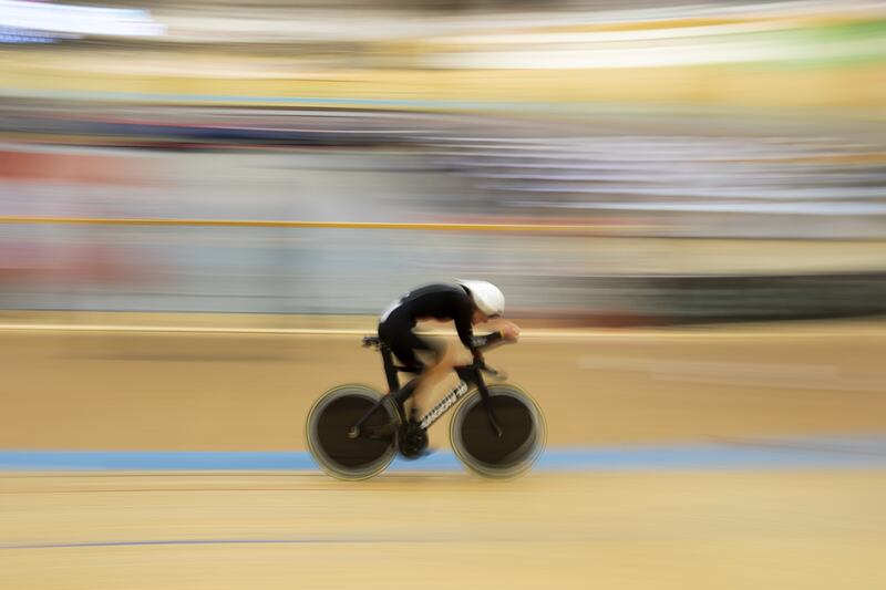 Britain's Joscelin Lowden on her way to breaking the one hour cycling world record at the Velodrome Suisse in Grenchen, Switzerland, on Thursday, September 30.  Lowden set a world record mark of 48,405 metres. EPA