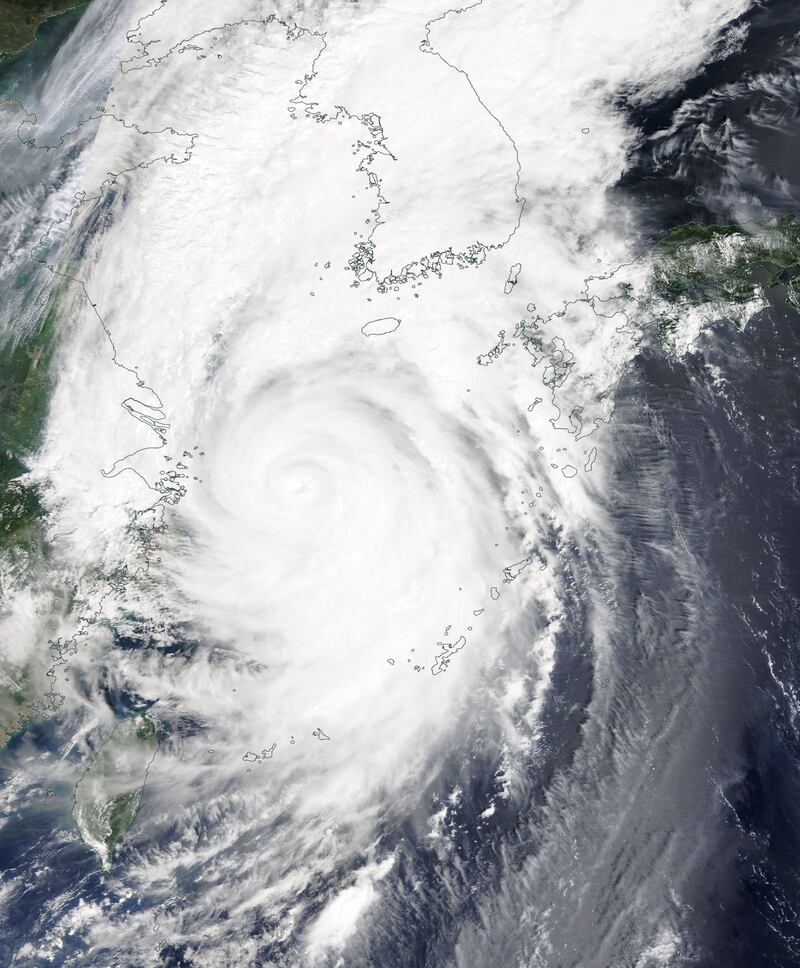 A handout satellite image made available by Nasa shows the typhoon's cloud formation. EPA