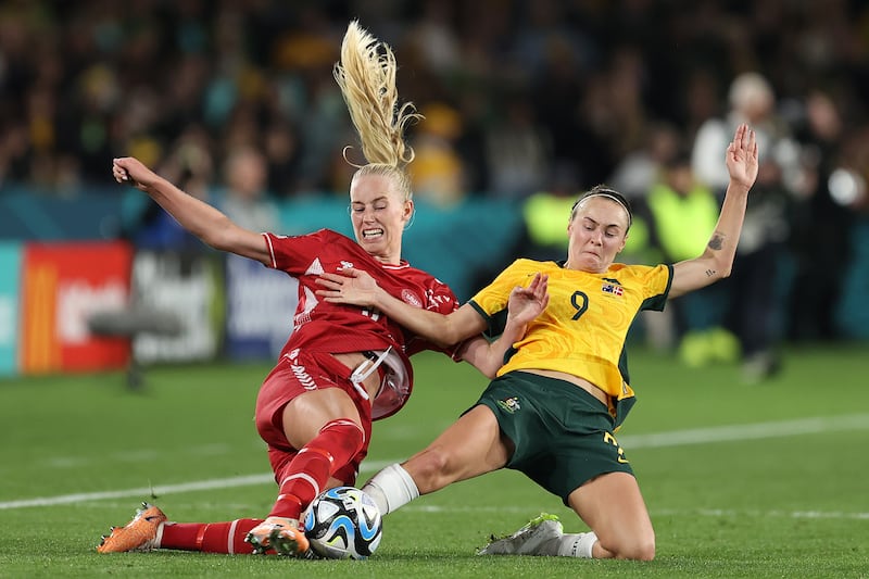 Amalie Vangsgaard of Denmark and Caitlin Foord of Australia compete for the ball. Getty Images 
