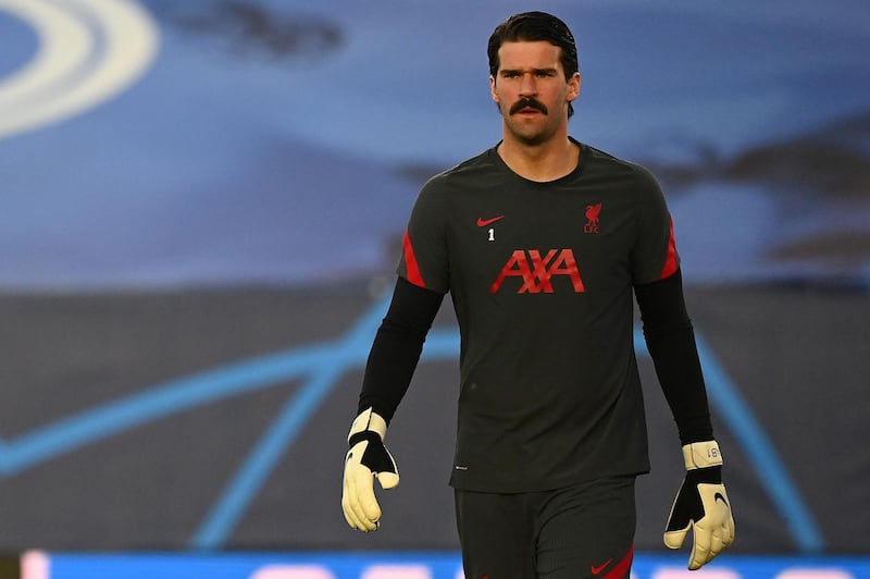 LIVERPOOL RATINGS: Alisson Becker - 4: The Brazilian was let down by his defenders for the first two goals but should have done much better on the third. AFP