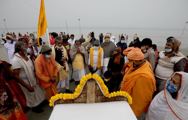 Worshippers gather at the sacred waters of the Ganges River before it reaches the Bay of Bengal. EPA