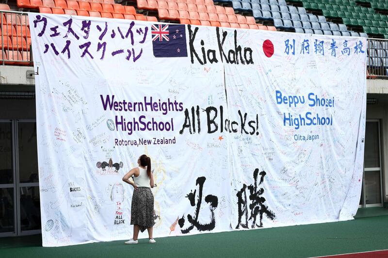 A banner bearing messages from high school students of sister cities of Rotorua in New Zealand and Beppu in Japan, on display at the All Blacks' training session at Kashiwanoha Park Stadium. AFP