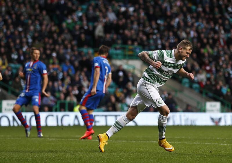 John Guidetti, right, and his Celtic teammates have won eight in a row but hold only a six-point lead in Scotland. Russell Cheyne / Reuters

