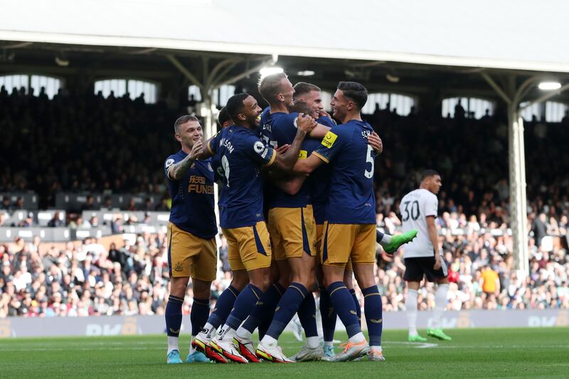 Sean Longstaff celebrates after scoring the third goal. Getty