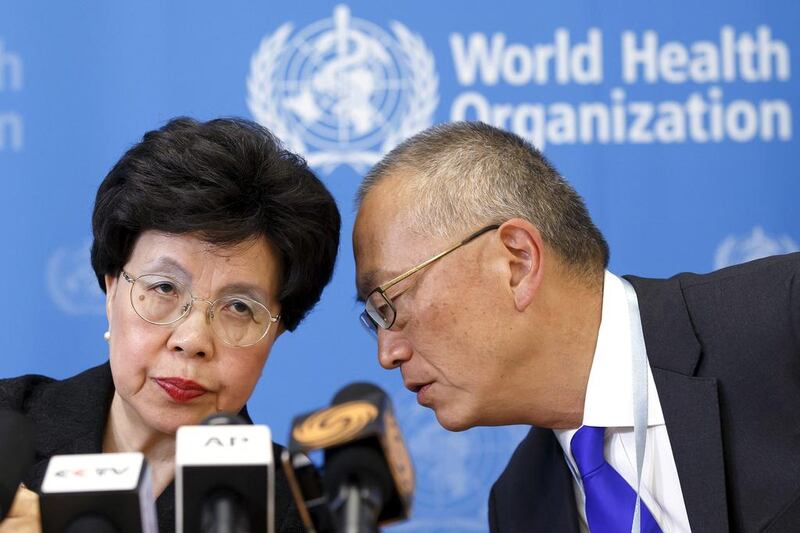 Director General of the World Health Organization, WHO, China’s Margaret Chan and Assistant Director General for Health Security Keiji Fukuda of the US, right, share a word during a press conference after an emergency meeting in Geneva over the Ebola crisis. Salvatore Di Nolfi / AP Photo /Keystone