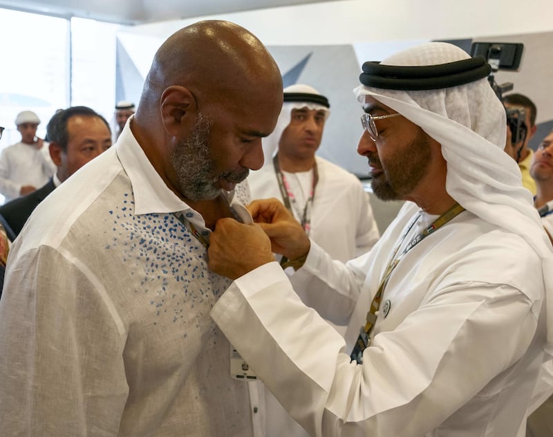 YAS ISLAND, ABU DHABI, UNITED ARAB EMIRATES - November 25, 2018: HH Sheikh Mohamed bin Zayed Al Nahyan, Crown Prince of Abu Dhabi and Deputy Supreme Commander of the UAE Armed Forces (R), speaks with Steve Harvey (L), at the Paddock Club on the final day of the 2018 Formula 1 Etihad Airways Abu Dhabi Grand Prix, at Yas Marina Circuit. 
( Hamad Al Kaabi / Ministry of Presidential Affairs )?
---
