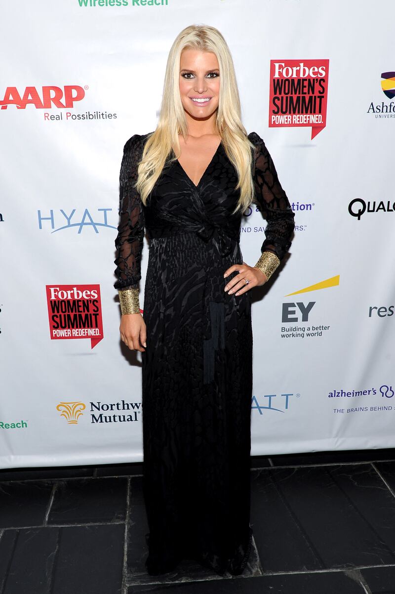 In a black Jessica Simpson Collection dress at the Forbes Women's Summit: The Entrepreneurship of Everything, in New York City on May 15, 2014. AFP