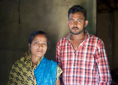 Sameer Sahani and his wife Sumathee live in their thatched house in the resettlement colony. Taniya Dutta / The National