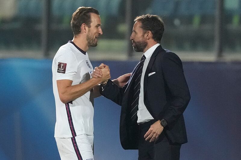 England coach Gareth Southgate, right, greets England's Harry Kane as he is substituted during the World Cup 2022 Group I qualifier against San Marino at Olympic Stadium, in Serravalle, San Marino, Monday, November 15, 2021. AP Photo